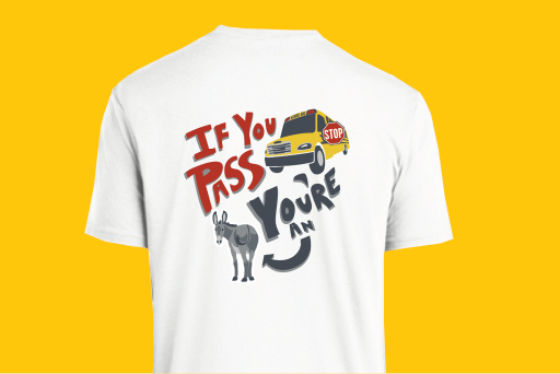 Link goes to Thomas Built store. Image is a white T-shirt with the "If you pass you're an" logo that has a school bus and an arrow pointing at the donkey's rear-end.